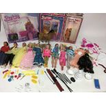 A collection of Barbie and Ken dolls with four poster bed, a Bubble bath and a Victoria Jane