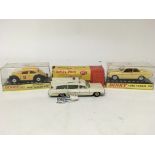 Dinky toys, #262 Schweizer post wagon PTT, #263 Superior criterion Ambulance and #154 Ford Taurus