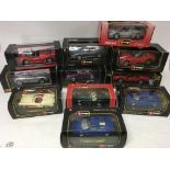 A collection of boxed Diecast 1:18 scale vehicles including Burago Porsche 911, Ferrari 550, Dodge
