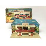 Codeg toys , model garage , tinplate , complete with Original box, Lithographed scenery and petrol