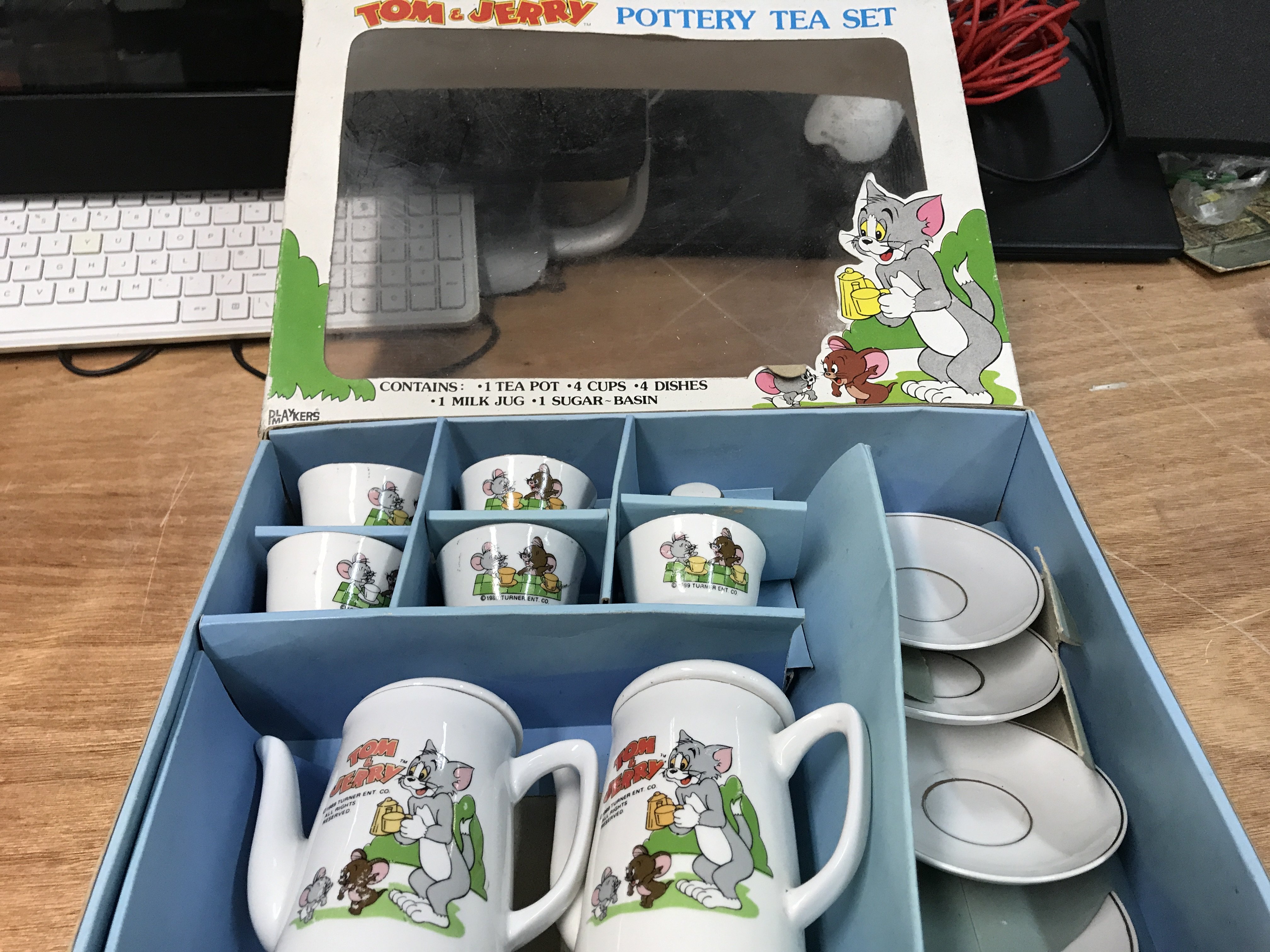 Tom and Jerry Pottery tea set, contains Tea pot, 4 cups , 4 dishes, milk jug and sugar basin, boxed