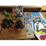 Masters of the universe, a collection of figures,booklets and an inflatable punchbag