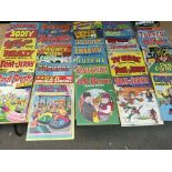 A collection of UK comics , mostly Holiday or Summer/ Winter specials including Tom and Jerry, Basil