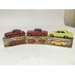Dinky toys, #156 SAAB 96, #57/002 Corsair Monza and #151 Vauxhall Victor 101, boxed