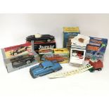 A collection of boxed toys including a Lone Star model crane , 2x Jaguar friction drive cars,