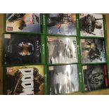 A collection of Xbox one games, x9