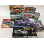 A collection of boxed remote control cars including Tandy Ferrari, Sonic controlled Porsche, Bump