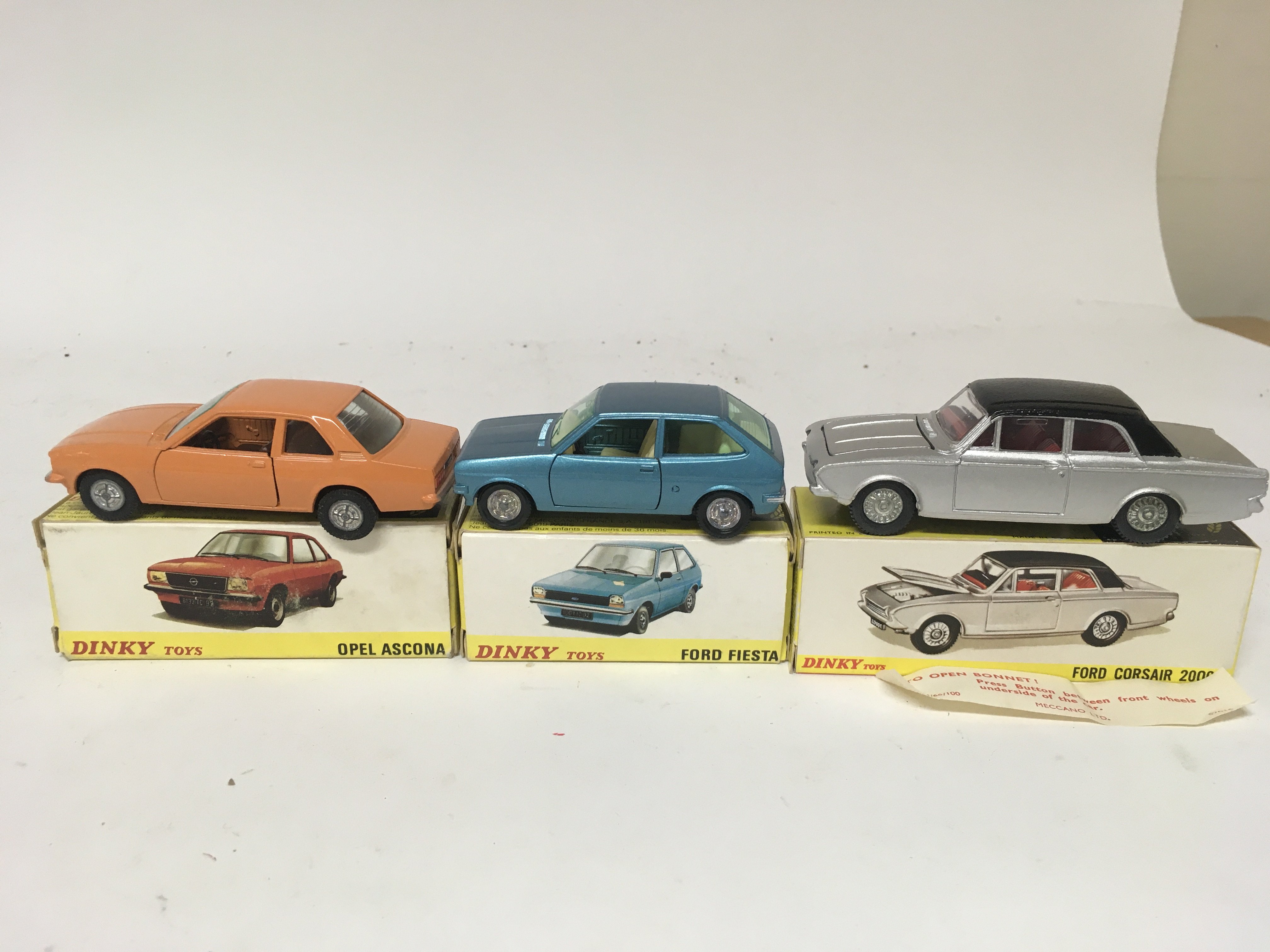 Dinky toys, #011543 Opel Ancona, #011541 Ford Fiesta and #169 Ford Corsair 2000, boxed