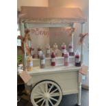 Sweet cart filled with Sweets from Dotties - beautifully decorated sweet cart, including jars full