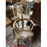 A late 19thC elm Windsor chair, high Wycombe desig