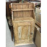 A pine one door cabinet, approx 91cm x 48cm x 20cm