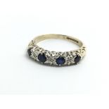 A 9ct yellow gold, sapphire and diamond half etern