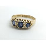 A vintage 18ct yellow gold sapphire and diamond ri