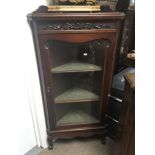 A Edwardian walnut corner display cabinet with thr