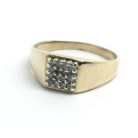 A gents 9ct yellow gold and sixteen stone diamond