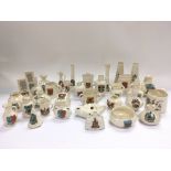 A collection of Goss crested ware items.