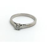 An 18ct white gold and diamond solitaire ring, app
