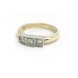 A 9ct yellow gold and three stone diamond ring, ap