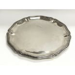 A large silver salva, diameter approx 35cm, approx