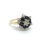 An 18ct yellow gold sapphire and diamond cluster r