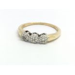 An 18ct yellow gold and diamond ring, small diamon