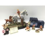 A collection of decorative figures of animals, inc