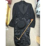 A dressage jacket, riding crop and bowler hat (3).