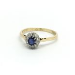 A vintage 18ct gold sapphire and diamond cluster a