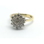 An 18ct yellow gold and diamond cluster ring, appr