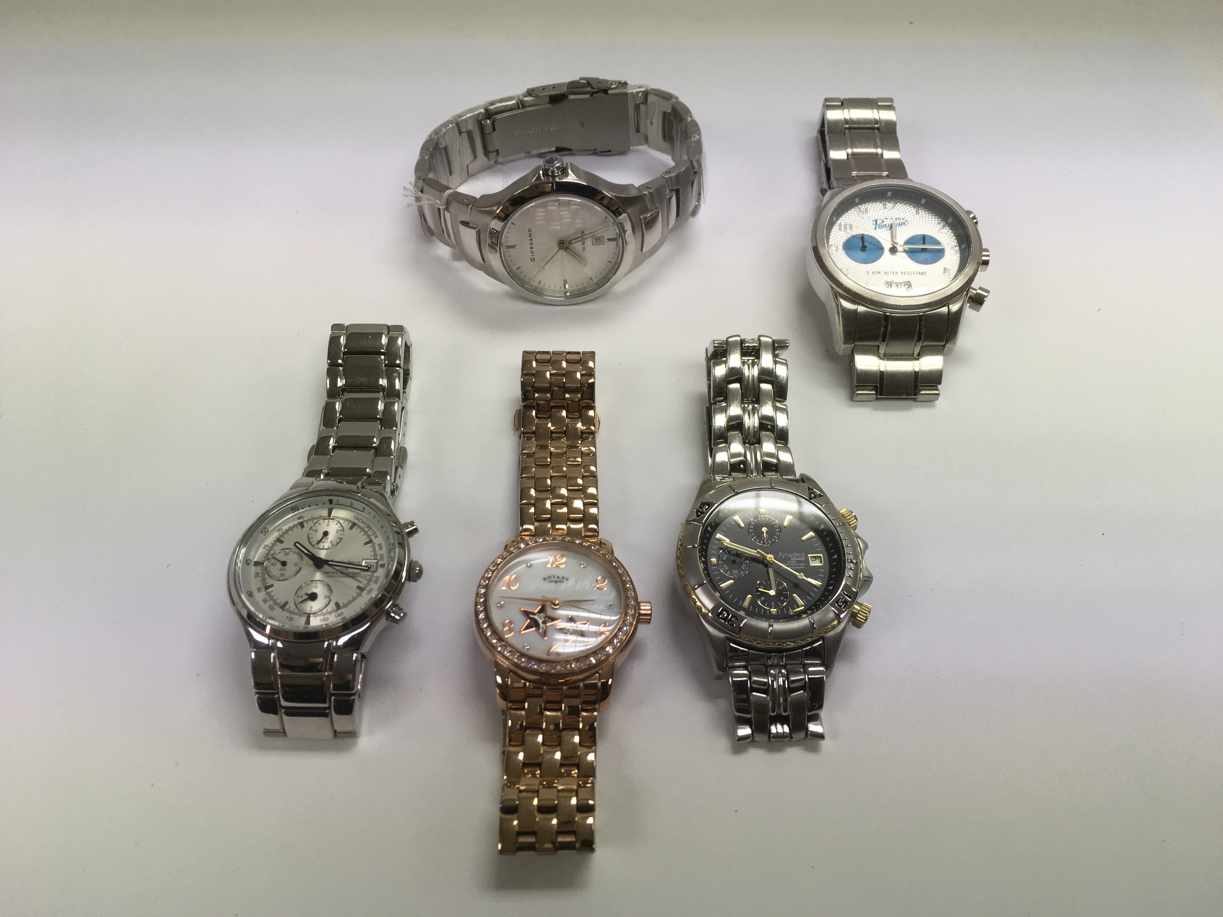 Five various watches including Rotary, Giordano an