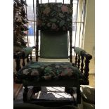 A Victorian walnut rocking chair.