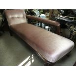 A Victorian chaise longue with pink upholstery on