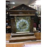 A late Victorian brass and silvered dial mantle cl