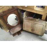 A small mahogany wall cabinet and one smaller cabi