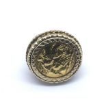 A gold sovereign ring, coin dated 1902, approx 10.