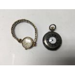 A ladies .935 silver half hunter pocket watch and