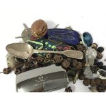A box of oddments including a silver spoon, beads