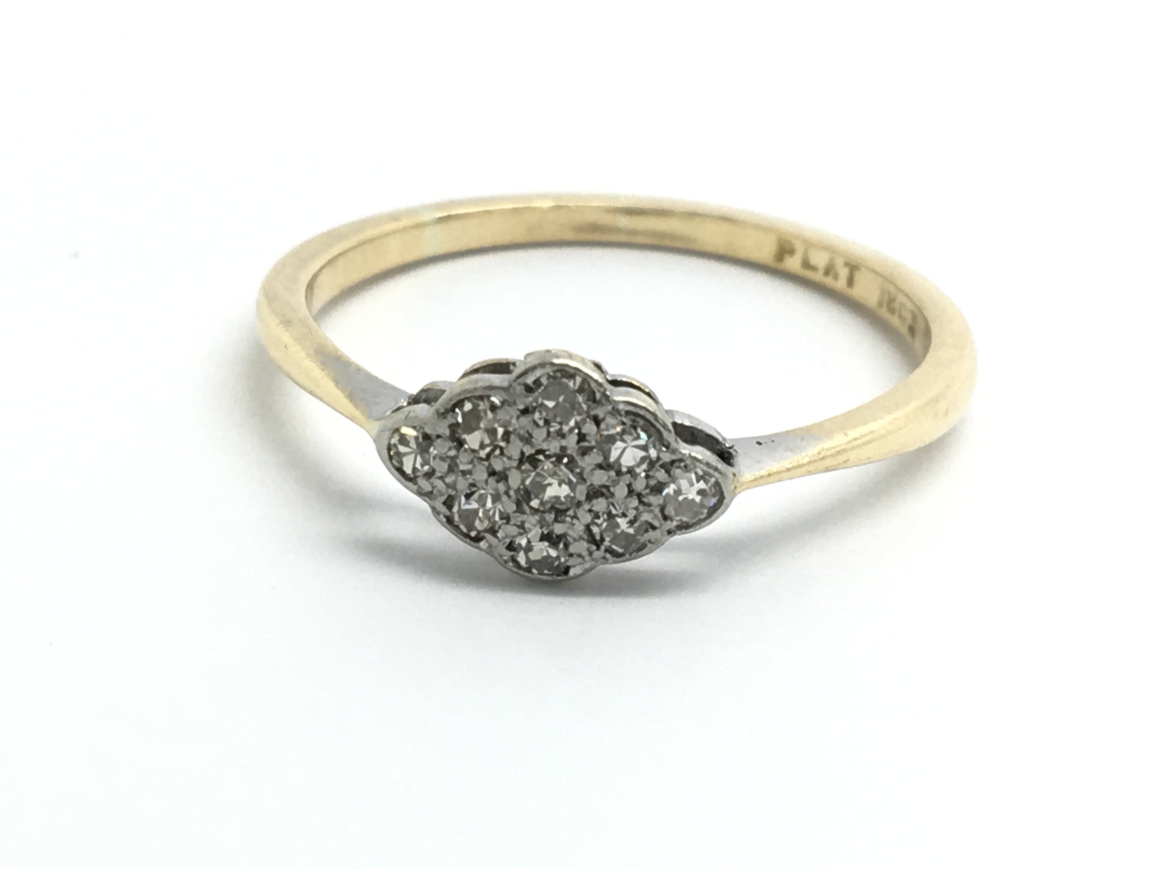 An 18ct platinum and diamond ring, ring size appro