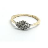 An 18ct platinum and diamond ring, ring size appro