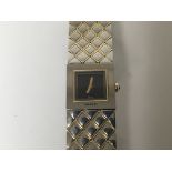 A ladies Steel and gold Chanel Matelassee Watch wi