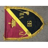 A red, gold and black Shield shaped banner with Ro