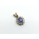 An 18ct yellow gold sapphire and diamond pendant