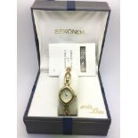 A boxed gold tone Sekonda watch.