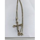 A 9 ct gold chain with attached cross pendant 7 gr