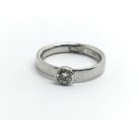 An 18ct white gold ring set with diamond solitaire