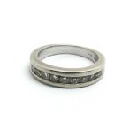 A 14ct white gold half eternity ring, set with a r