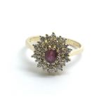 An 18ct yellow gold ruby and diamond cluster ring,