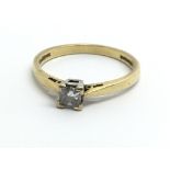 An 18ct yellow gold and princess cut diamond ring,