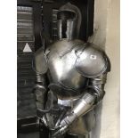 A reproduction Teutonic suit of armour, 6ft 3" on