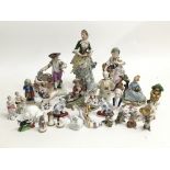 A collection of porcelain figures by various maker